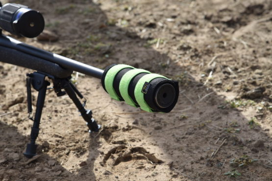 image1 555x370 - SUB-TAC ALPHA SUPPRESSOR COVER 7.5 INCH BLACK with LIME GREEN straps/paracord